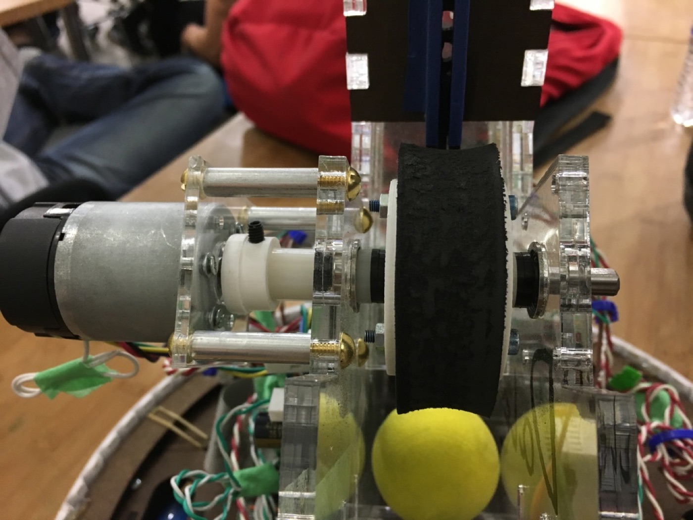 Close-up of the skate-wheel drivetrain and DC motor