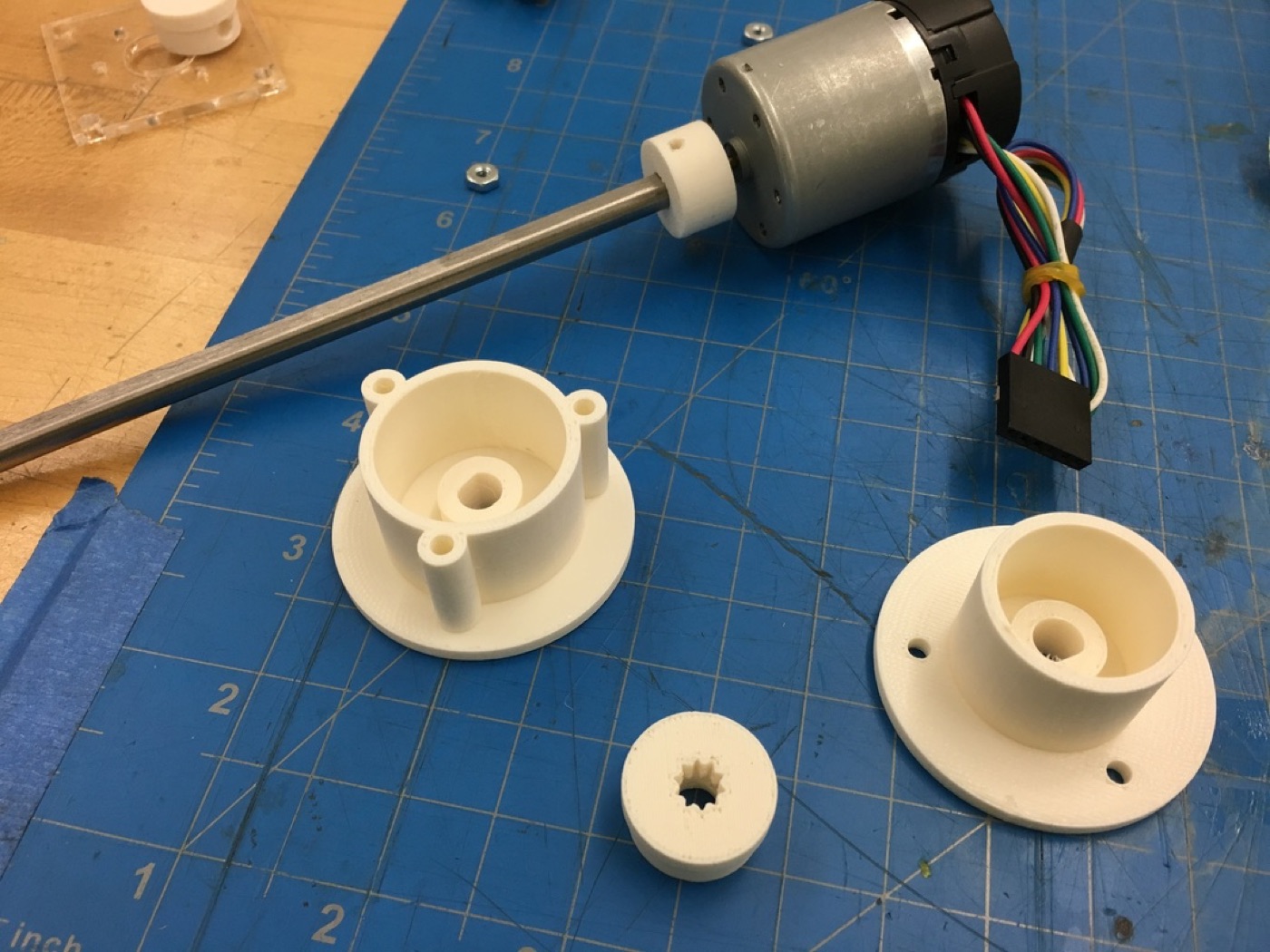 Printed wheel adaptors and a motor on a cutting mat